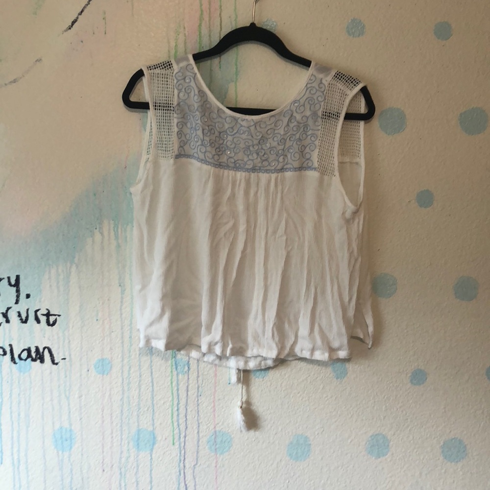 cute white loose tank with cute designs all over